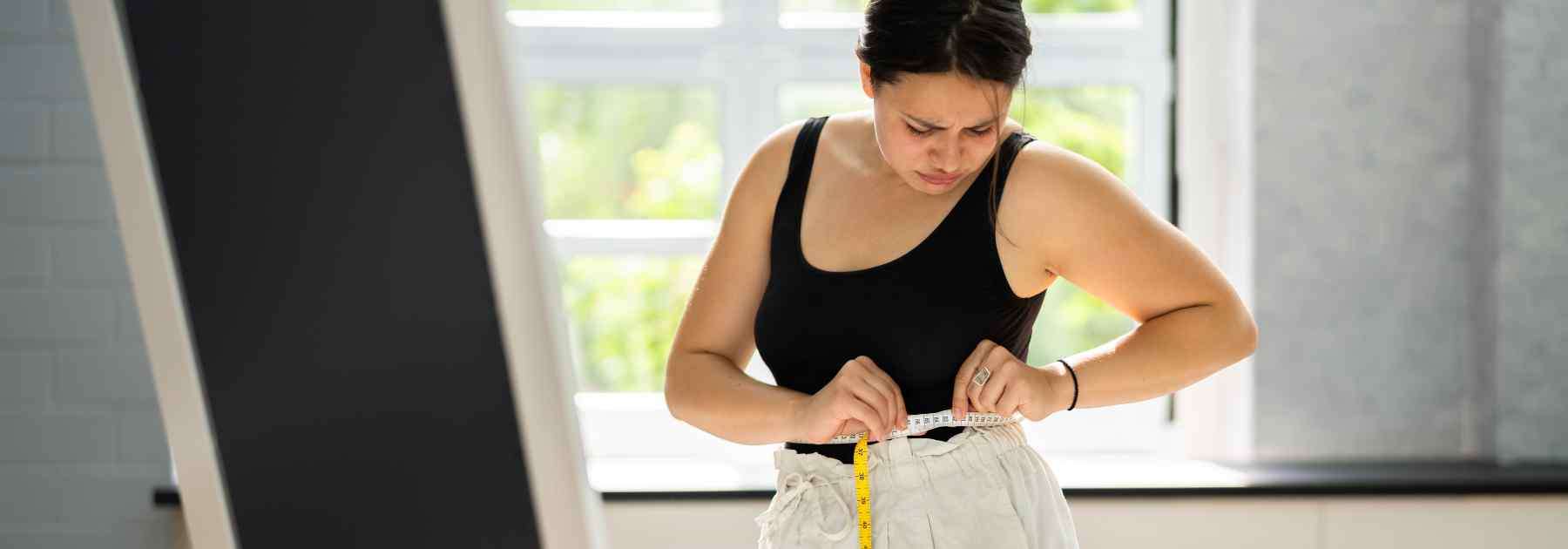 happy woman with weight loss